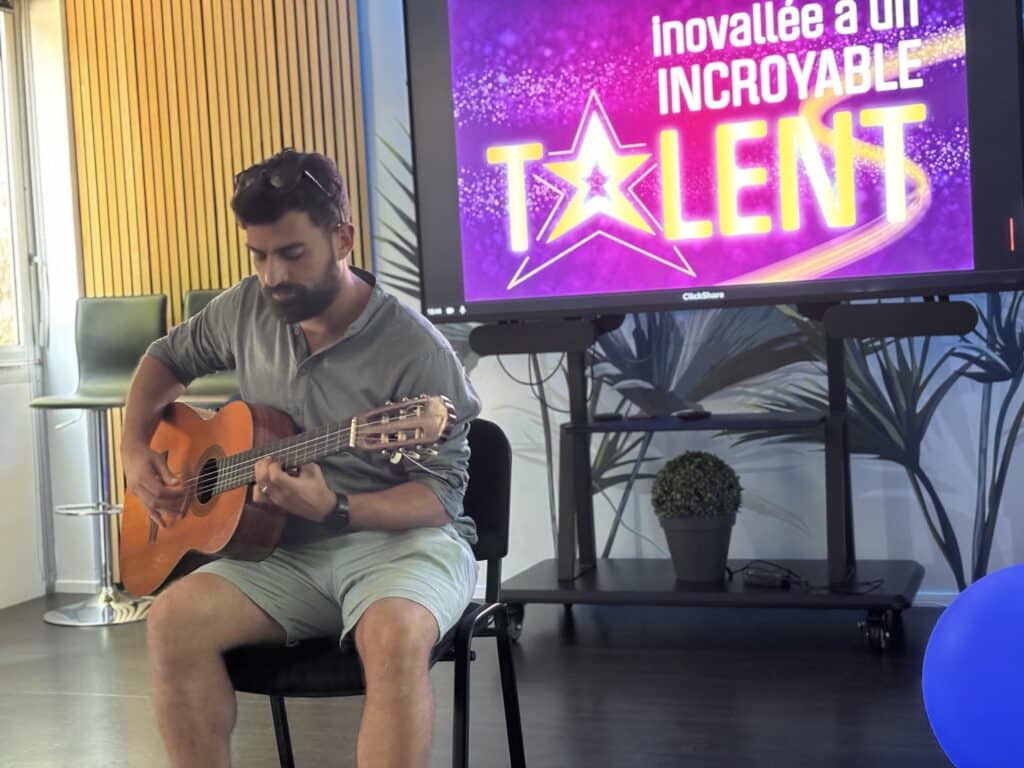 Olympiades teambuilding QVT inovallée technopole, un incoryable talent guitariste